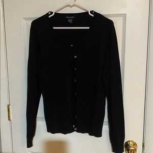 Black cardigan with round clear buttons down the front. Large, lightly worn!